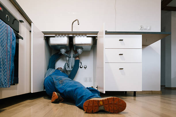 Professional Emergency Plumber technician working in Forest Lake, MN